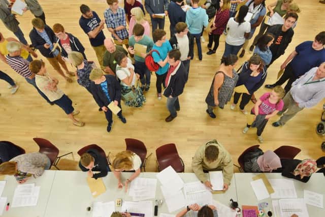 Pupils collecting GCSE results