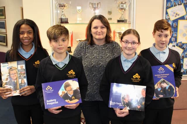 Principal Sarah Wilson with Year 8 pupils Scarlett Dornelly, Owen Park, Lewis Rainger and Jaiden Taylor