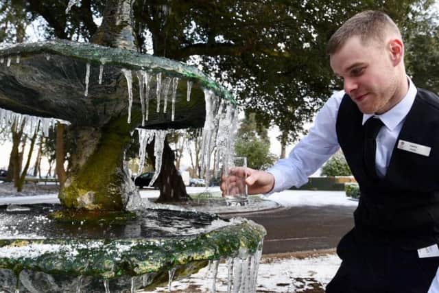 Charlie Hovell, at Orton Hall Hotel in Peterborough. getting some ice for a drink from the hotel fountain