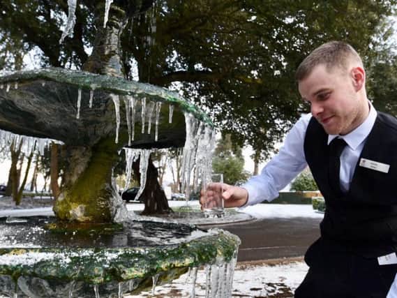 Charlie Hovell, at Orton Hall Hotel in Peterborough. getting some ice for a drink from the hotel fountain