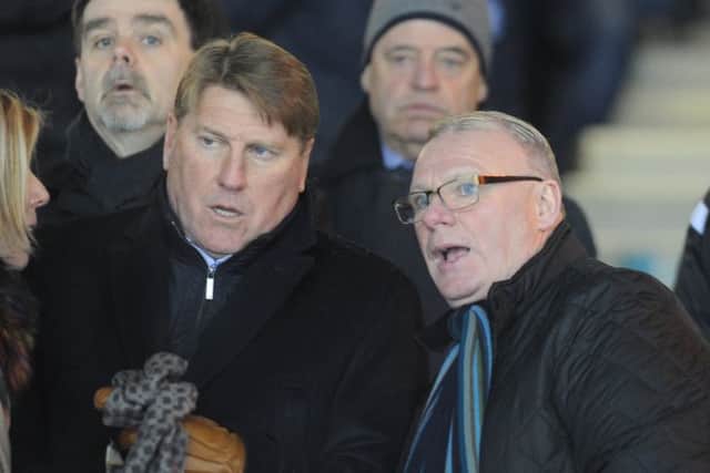New Posh manager Steve Evans (right) and his assistant Paul Raynor at the ABAX Stadium last night.