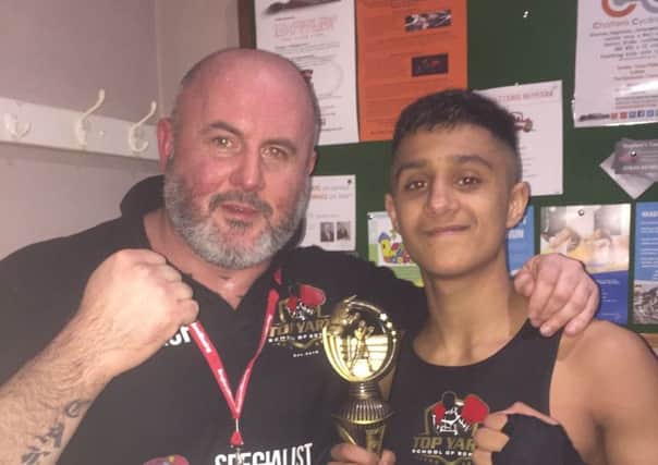 Top Yard coach Andy Hutchins with  Mohammed Ali Hassan.