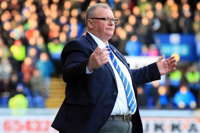 Steve Evans managing Mansfield earlier this season.