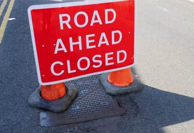 Road closed sign