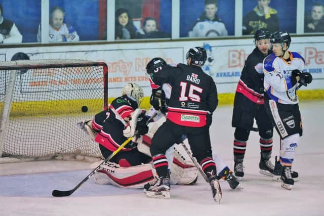The puck is on its way towards the Basingstoke net during the match at Phantoms. Photo: David Lowndes.
