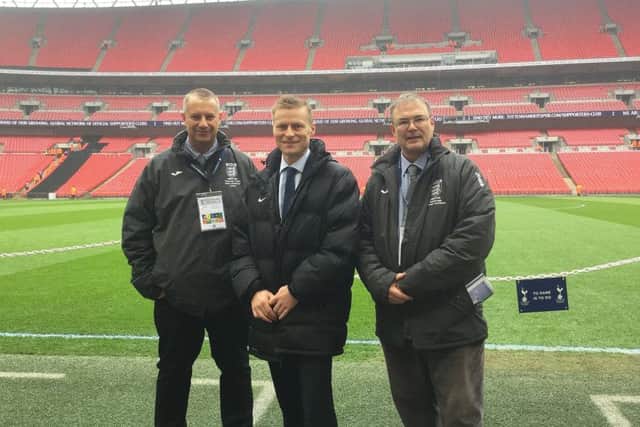 Neil Smith (left) pictured pitchside at Wembley with Mike Jones and Rob Windle (right). Picture: RWT Photography