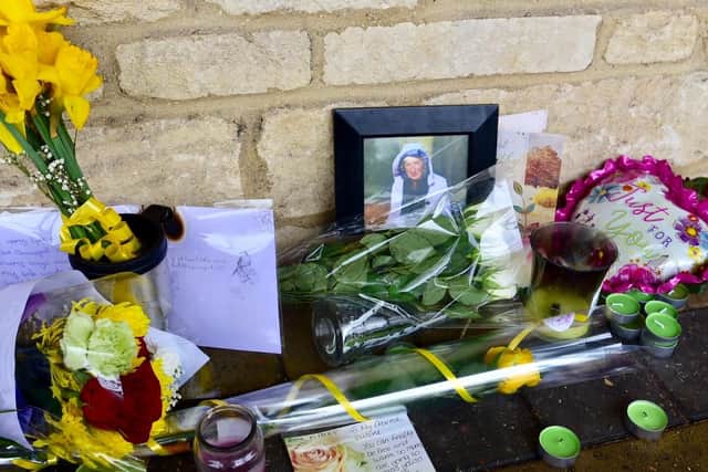 Tributes to Valerie left at the spot where she was found in Peterborough.