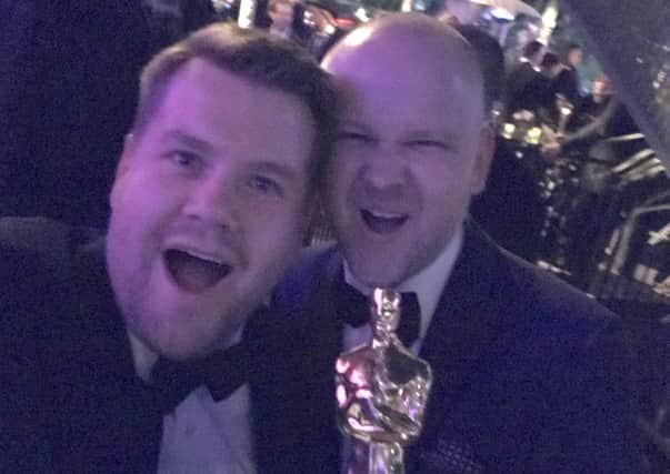 David (right) with James Corden