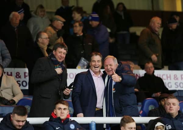 New Posh co-owners Jason Neale (left) and Stewart Thompson (centre) with the club's director of football Barry Fry at a home game earlier this season.