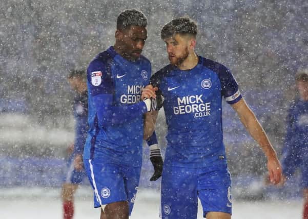 Omar Bogle (left) scored twice in a Posh practice match and Jack Baldwin (right) successfuly came through a fitness test.