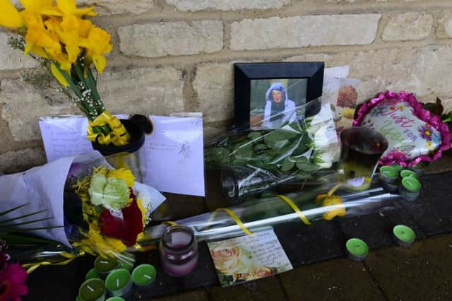 Tributes left at the spot where Valerie Collins was found this week