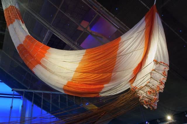 The huge parachute used to bring the ship and its crew back to earth safely