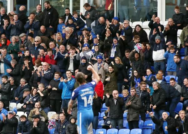 Posh fans rise to acclaim Jack Marriott after his first goal in the 4-1 win over Charlton. Photo: Joe Dent/theposh.com.