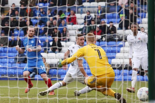 Jack Marriott scores to make it Posh 3, Charlton 1. Photo: Joe Dent/theposh.com.