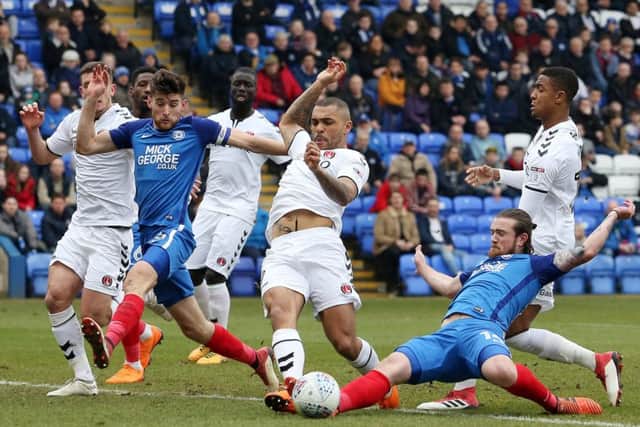 Posh striker Jack Marriott attempts a slide tackle in the 4-1 win over Charlton. Photo: Joe Dent/theposh.com.