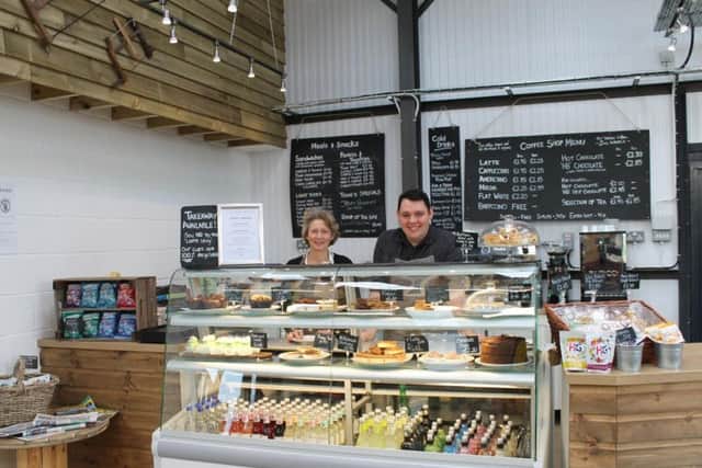 Harvest Barn owner Lynn Briggs and Ashley Holland, assistant manager, in the new farm shop.