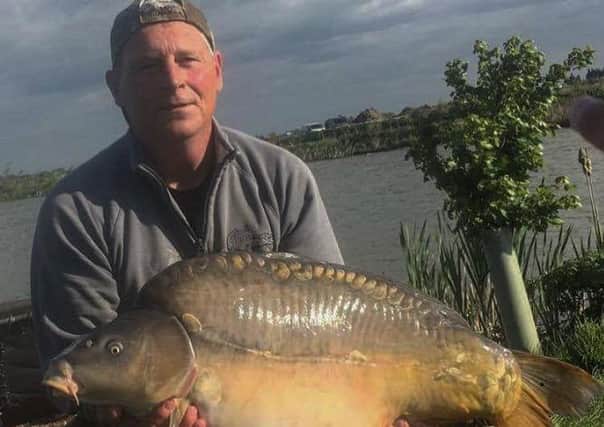 Dave Winkley with a huge fish taken from the Lapwing Pool.
