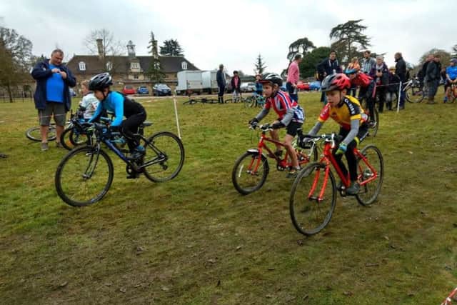 Young Fenland Clarion rider Louis Cipriani  (right) shows his determination in the Under 10 race.