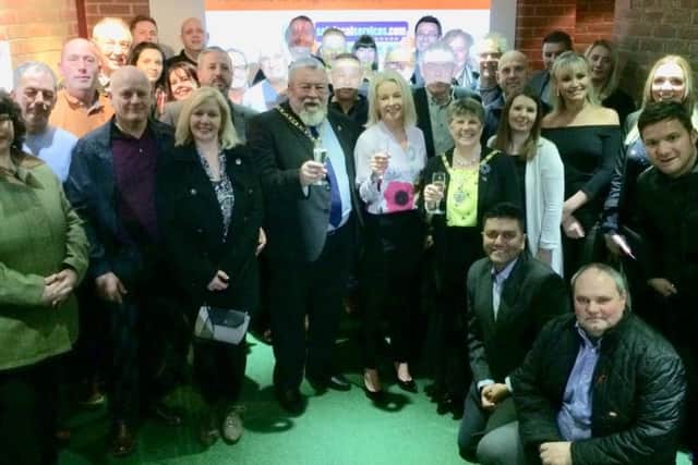 Toasting 10 years of Safe Local Trades  members with director Eileen Le Voi (centre) joined by Peterborough City Council Mayor Cllr John Fox and Mayoress Judy Fox.