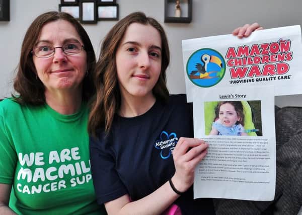 Julie Thompson  and daughter Hannah Thompson (15) from Sugar Way, Woodston. They are raising funds for four different charities EMN-180203-160252009