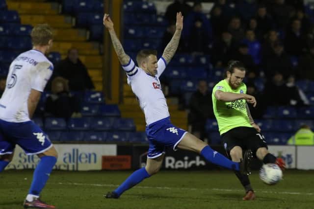 Posh striker Jack Marriott lets fly at goal at Bury. Photo: Joe Dent/theposh.com.