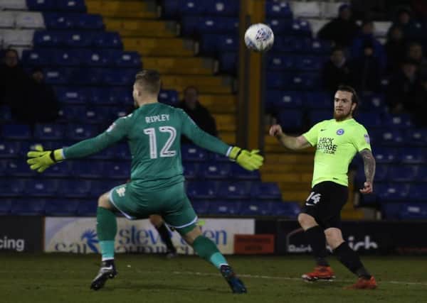 Posh top scorer Jack Marriott lobs Bury 'keeper Connor Ripley to claim the only goal of the game. Photo: Joe Dent/theposh.com.