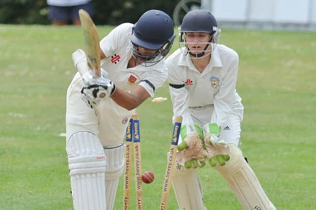 Danyal Malik batting for Oundle Town against Peterborough Town.