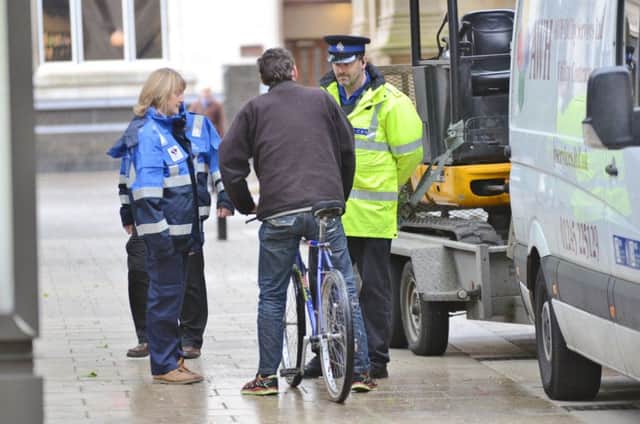 A cyclist is fined on Bridge Street