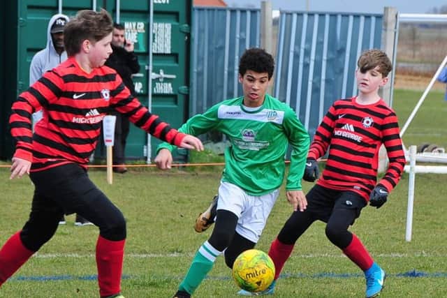 Action from the game between Park Farm Pumas Black Under 13s and FC Peterborough.