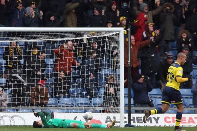 Posh goalkeeper Jonathan Bond is flat on his back after Oxford's second goal. Photo: Joe Dent/theposh.com.