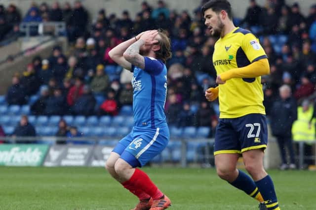 Posh striker Jack Marriott has his head in his hands after missing a late chance to equalise. Photo: Joe Dent/theposh.com
