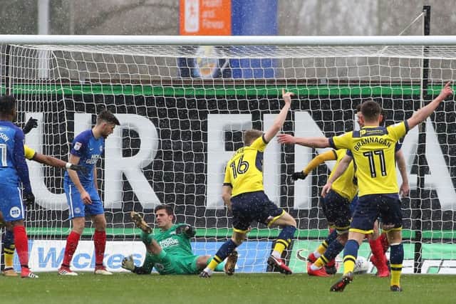 Oxford celebrate their early goal from Rob Dickie against Posh. Photo: Joe Dent/theposh.com.