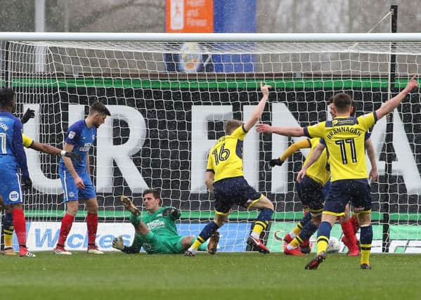 Oxford celebrate their early goal from Rob Dickie against Posh. Photo: Joe Dent/theposh.com.
