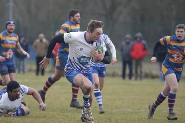 Tom Gulland is on his way to scoring a try for Peterborough Lions against Old Halesonians. Photo: Mick Sutterby/picturethisphotography