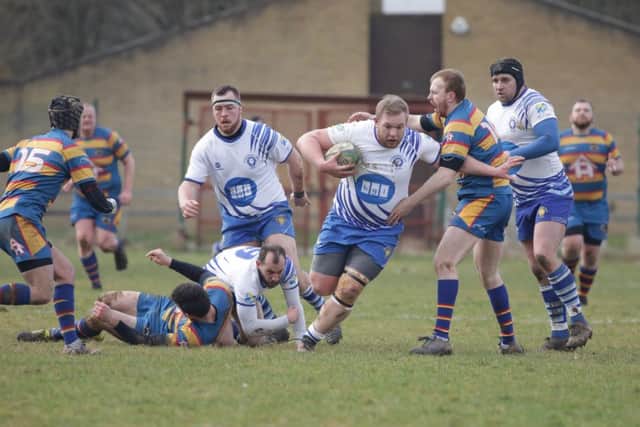 Tom Jones on the attack for Peterborough Lions against Old Halesonians. Picture: Mick Sutterby