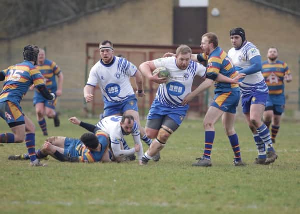 Tom Jones on the attack for Peterborough Lions against Old Halesonians. Picture: Mick Sutterby
