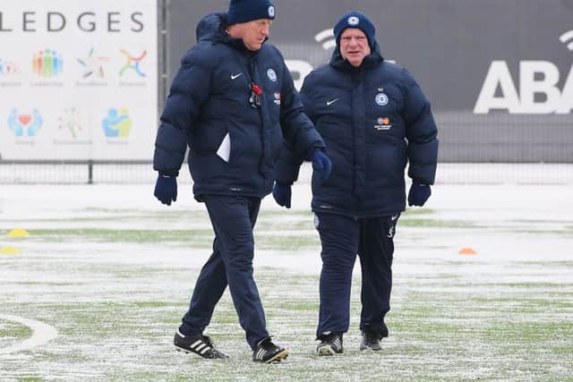 Posh boss Steve Evans (right) and assistant manager Paul Raynor.