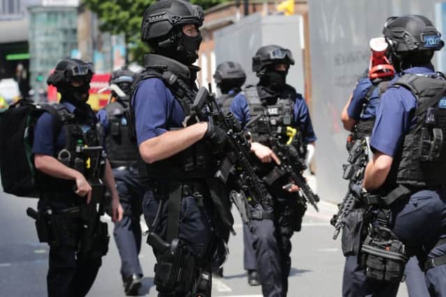 Armed police at Borough Market , near the scene of the terrorist attack 4 June 2017 PNL-170606-153852001