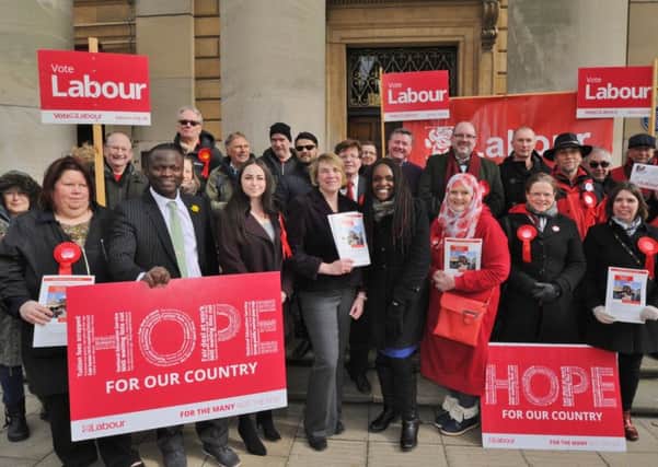 Labour Party candidates and supporters  outside the Town Hall with MP for Peterborough Fiona Onasanya EMN-180317-173251009
