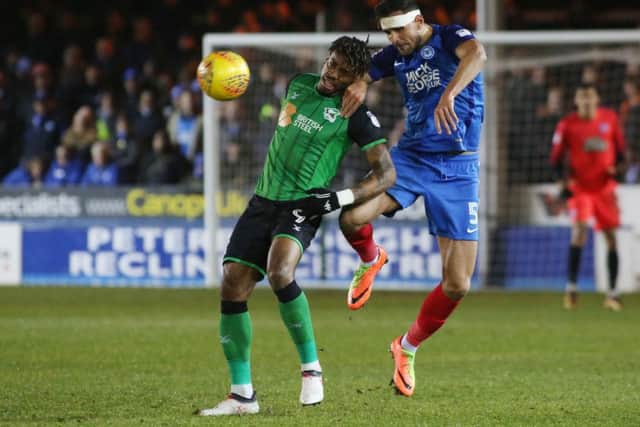 Ryan Tafazolli (right) is expected to start for Posh against Bristol Rovers.