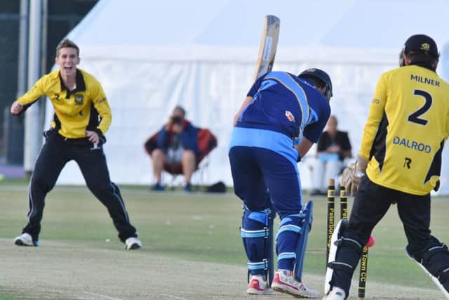 Peterborough Town's Daniel Oldham bowls Bourne's Sam Evison in last year's Jaidka Cup FInal.