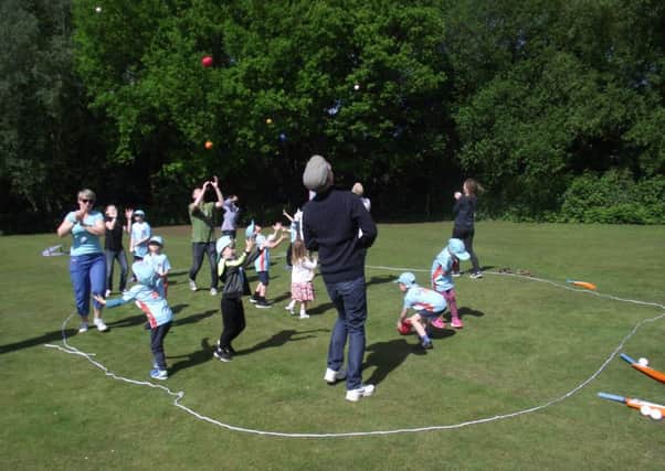 Children enjoying an 'All Star Cricket' session.