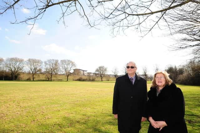 Peterborough City Council  Leader Cllr John  Holdich and education cabinet member Cllr Lynne Ayres at the site of proposed University of Peterborough teaching facilities on Bishop's Road EMN-180321-152923009