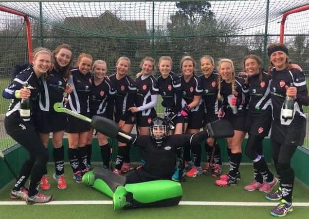 Bourne Deeping Ladies celebrate their title success in East Division Three North West.