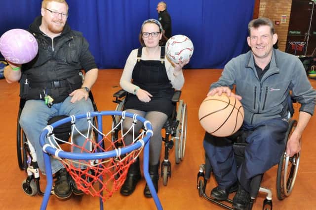 Mick Born, Sophie Richardson and Barry Plumb playing wheelchair basketball during Sporting Saturday 2018 at The Cresset