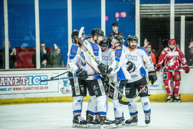Phantoms players celebrate their play-off win over Swindon. Photo: Alan Storer/Feral Marmot Films.