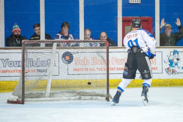 Nathan Salem scores an empty net goal for Phantoms against Swindon. Photo: Alan Storer/Feral Marmot Films.