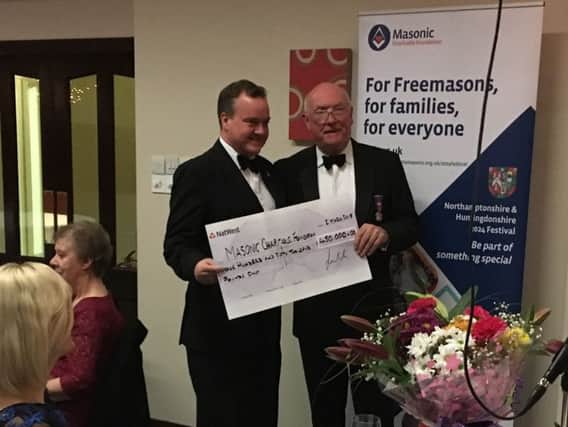 Max Bayes and Les Hutchinson with the Cheque at MCF Launch.