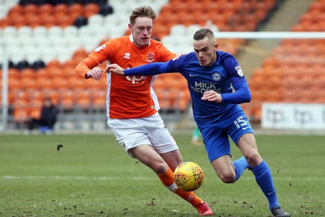 Joe Ward (right) scored twice for Posh reserves at Cambridge.