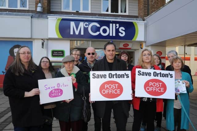 The demonstration outside McColl's EMN-180326-134256009
